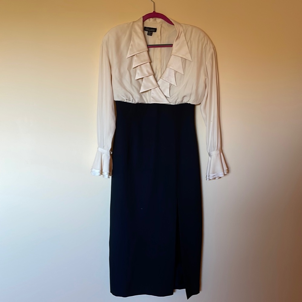 Black and white dress, looks like blouse and skirt. Fitted skirt.